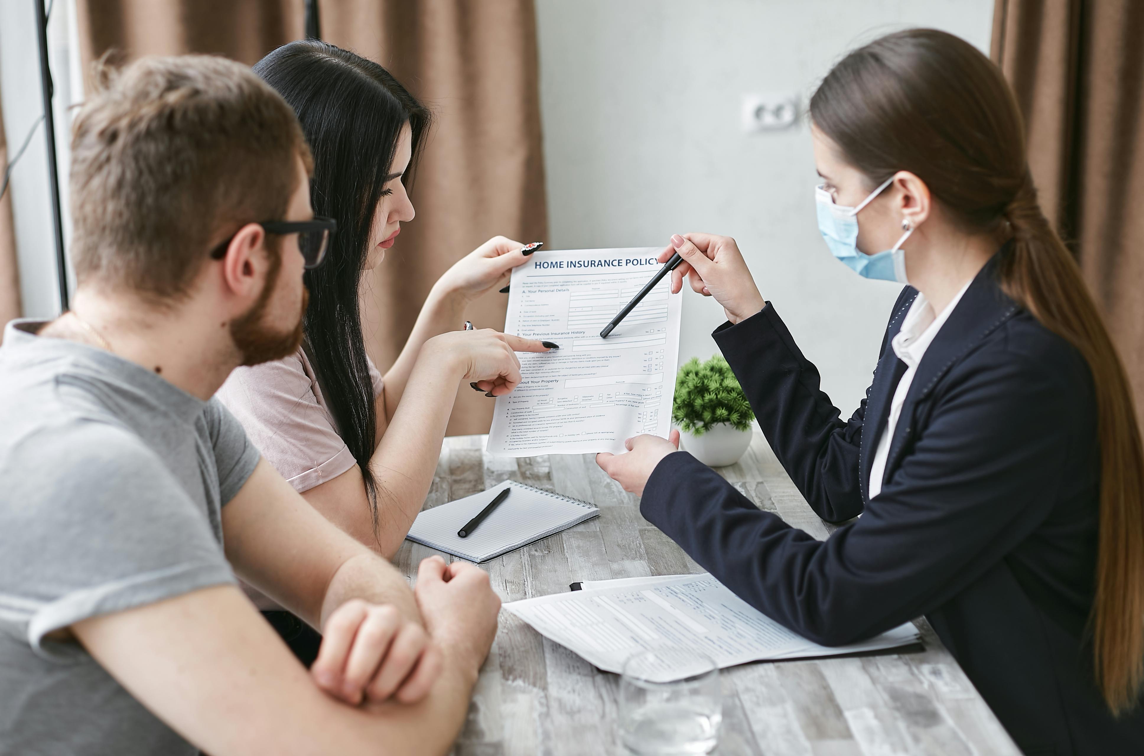 Insurance advisor speaking with a client